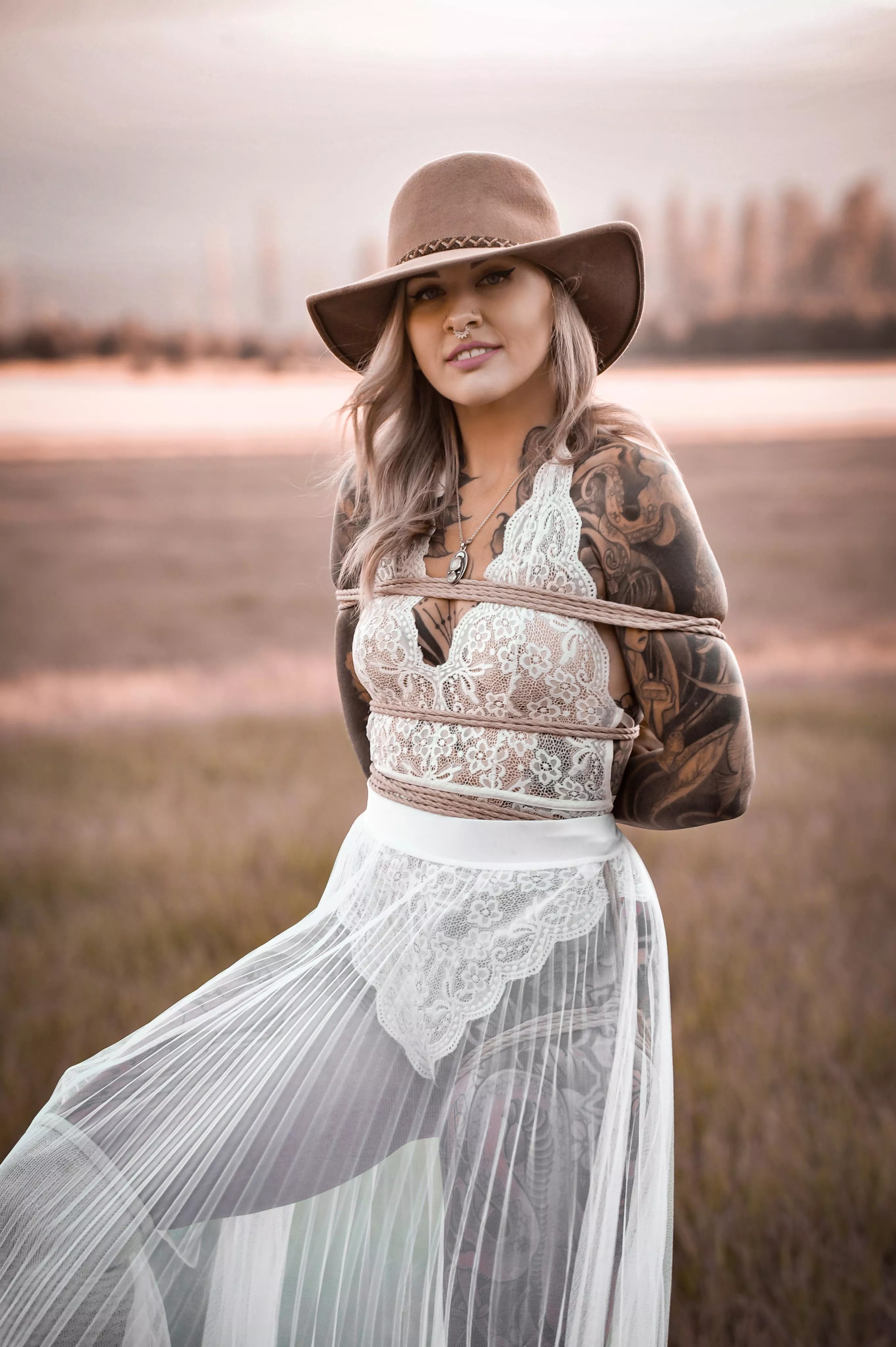 How do you feel about a tied up tattooed girl?