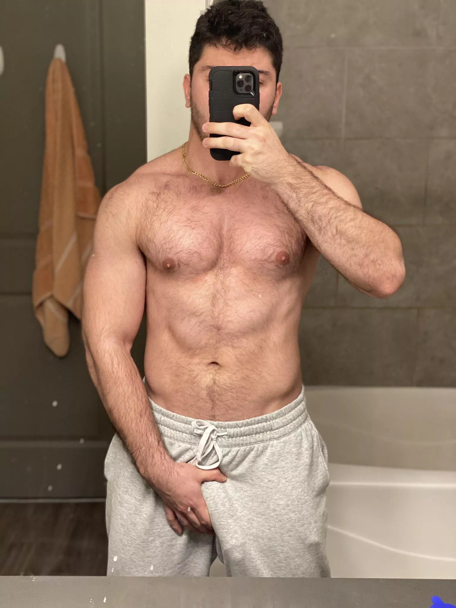 I love letting my huge cock swing around in my grey sweatpants.