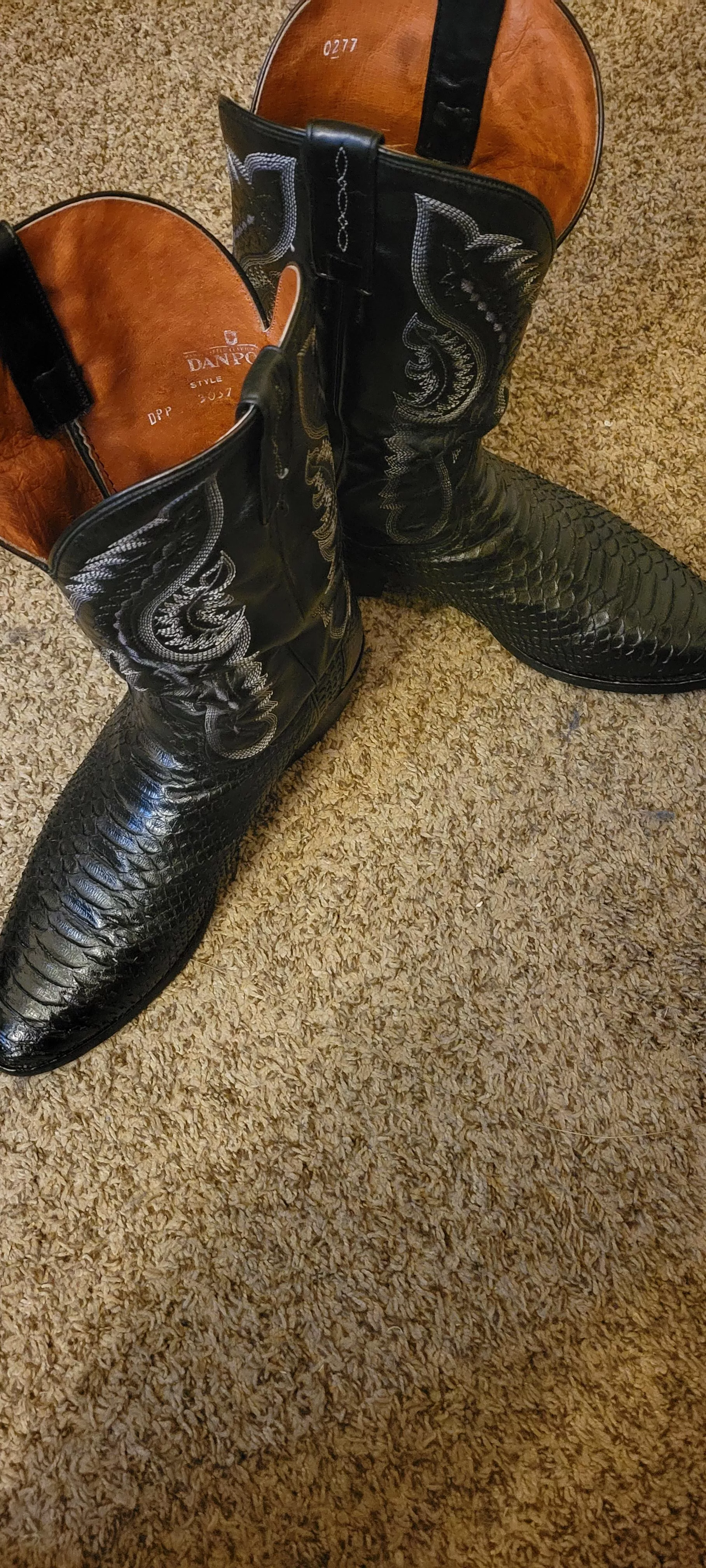 I was lucky enough to come upon a pair of Dan Post lizard skin boots for a bargain. The store owner said that they had been worn a few times, and then the fella who bought them passed away. His wife returned the boots, and the store owner gave her a refu