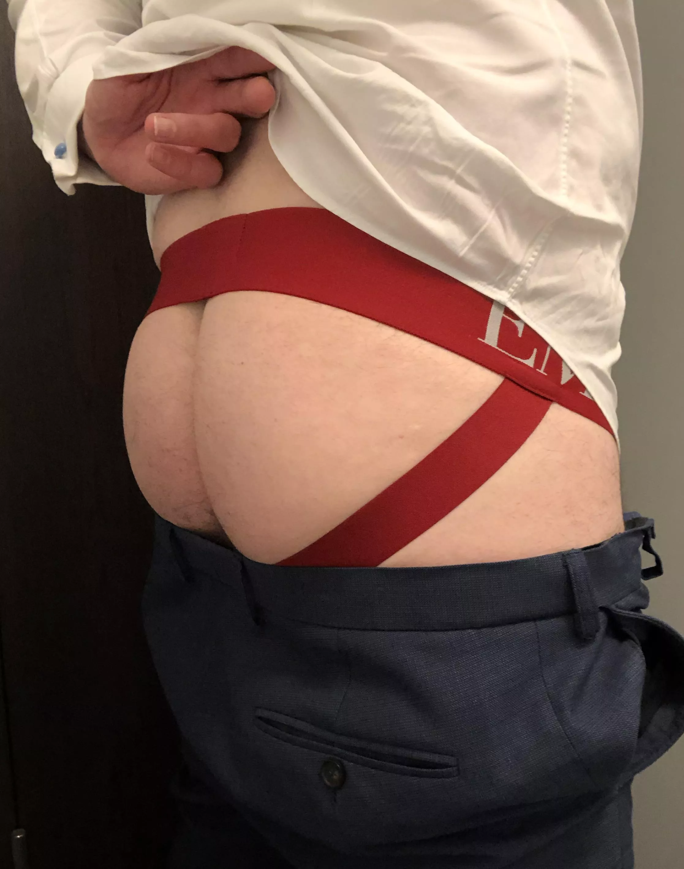 If I wear a jockstrap to work, it tends to be on casual Friday. So wearing one today under suit trousers is a new experience (41)