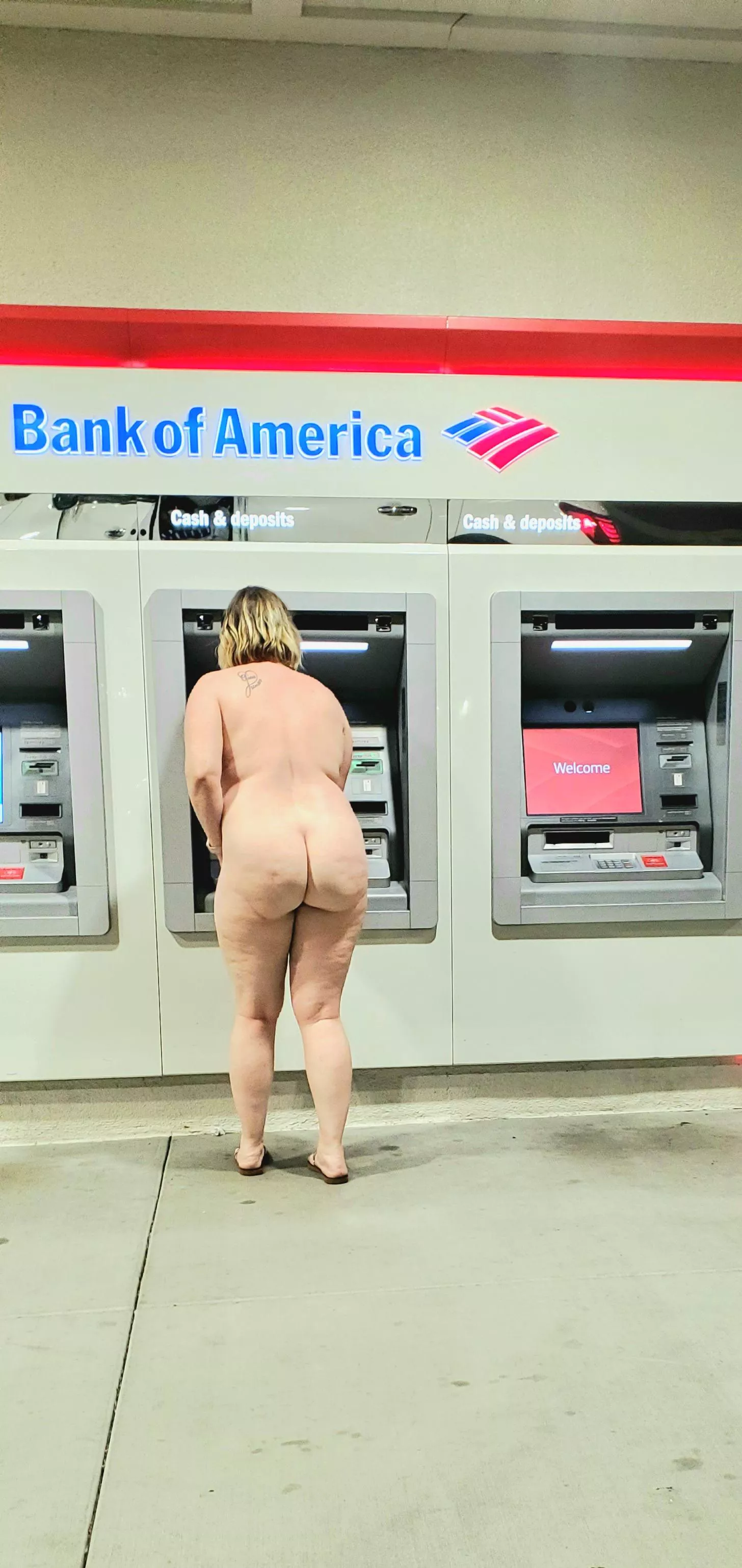 I'm new here, does this count? At the ATM naked with my ass jiggling as I do some banking.