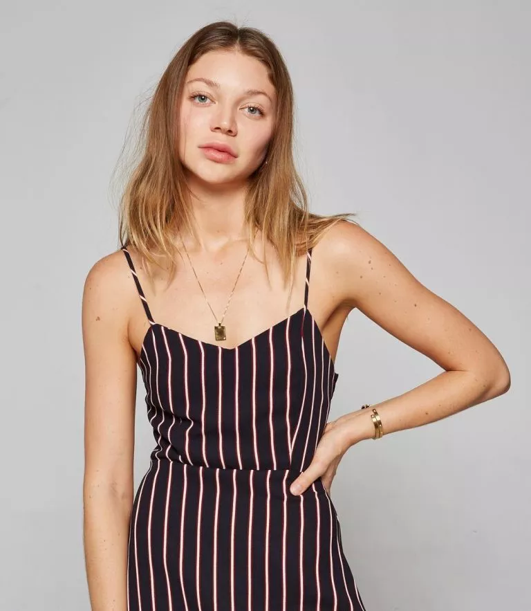 Jessie Andrews glum in a dress...