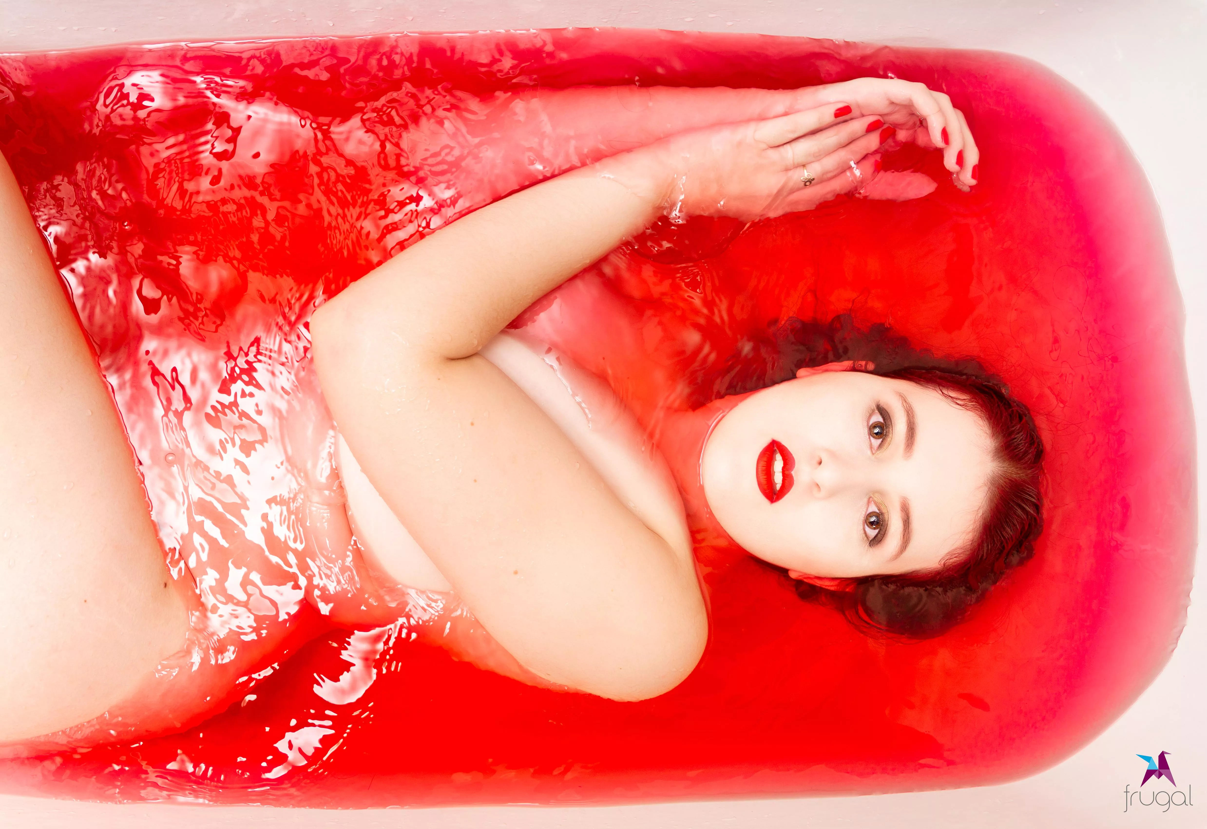 Just taking a bath, with my hair dye tinting the water 🤭