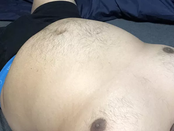 Laying in bed.