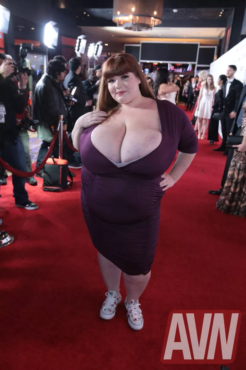 Lexxxi Luxe showing a ton of cleavage on the red carpet