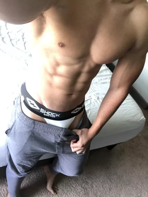 Liking the grey sweatpants and jockstrap combo lately