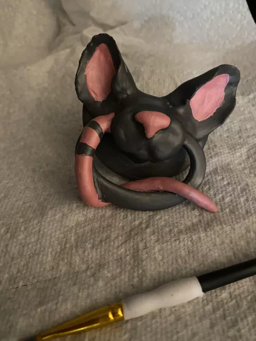 Little project I’ve been working on. I haven’t sculpted or painted anything since I was a kid. Decided I’d give it a shot on this paci. It’s a major WIP, but thoughts?
