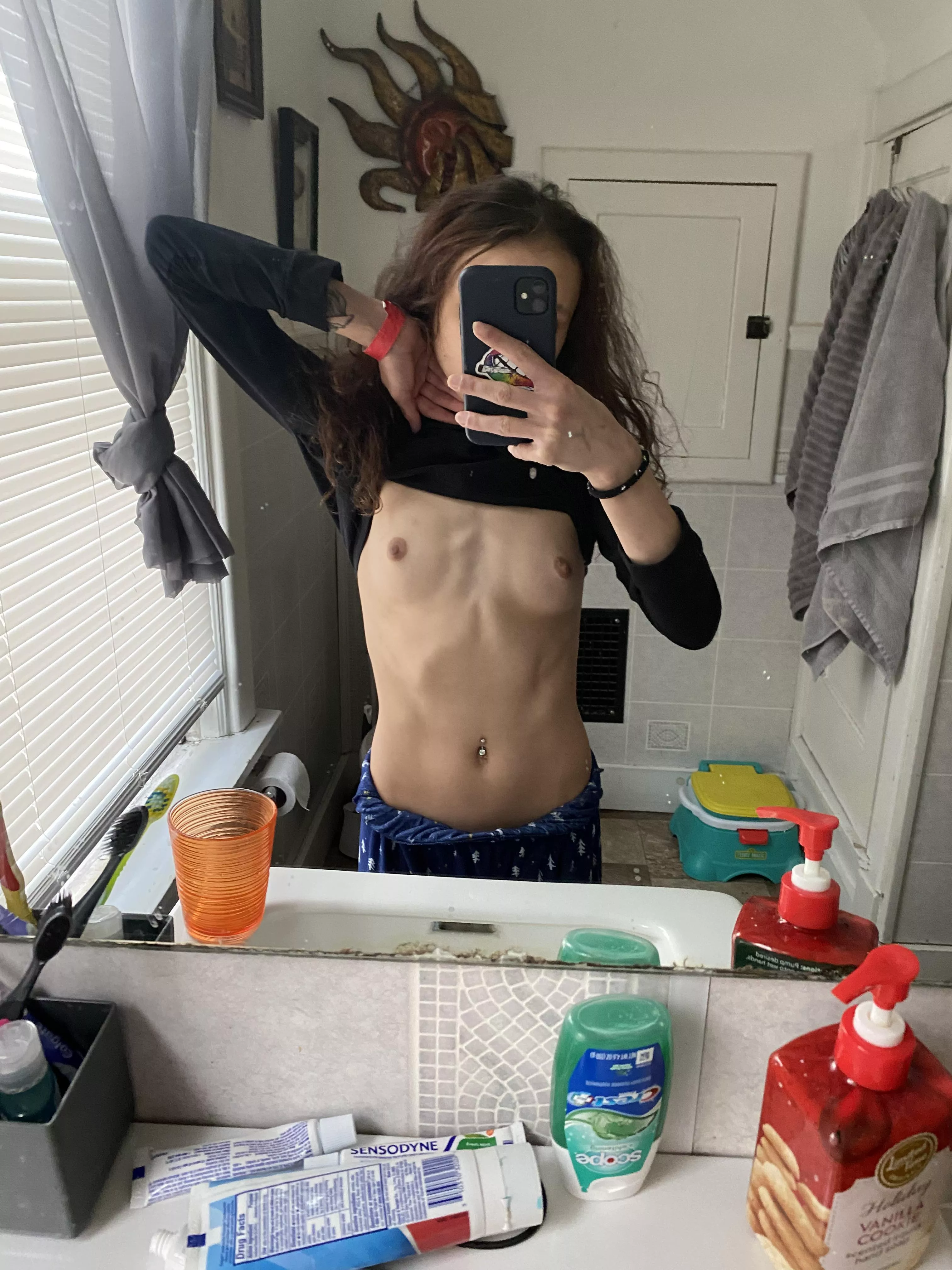 Little tits and a flat tummy :)