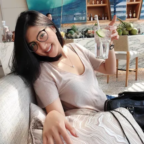 Low cut and smiling
