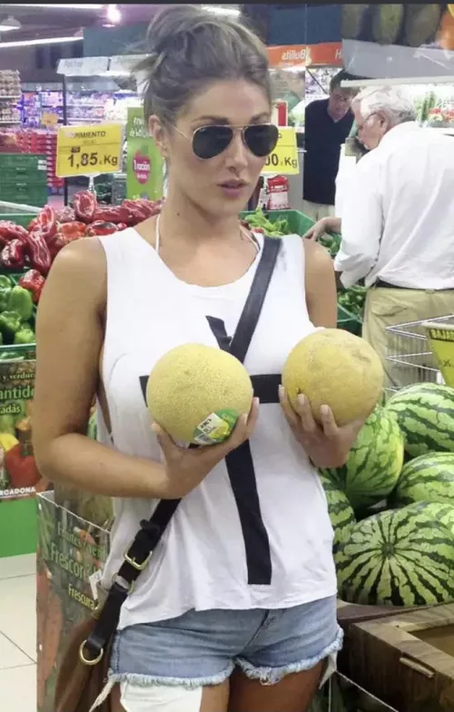 Lucy holding her melons