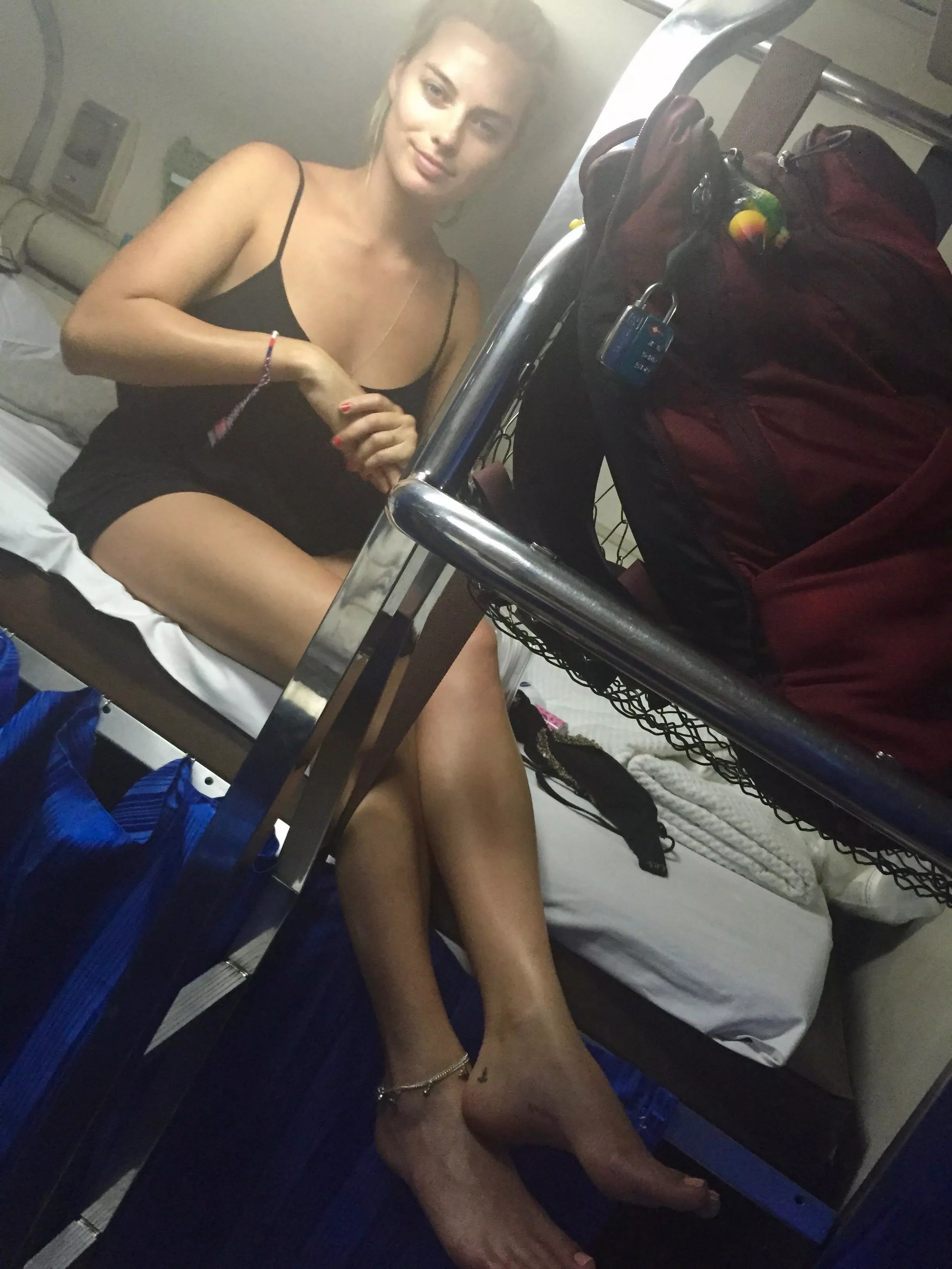 Margot Robbie ready to get her legs & feet worshipped behind the scenes