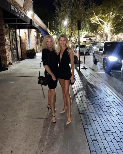 mom and daughter in their little black dresses.