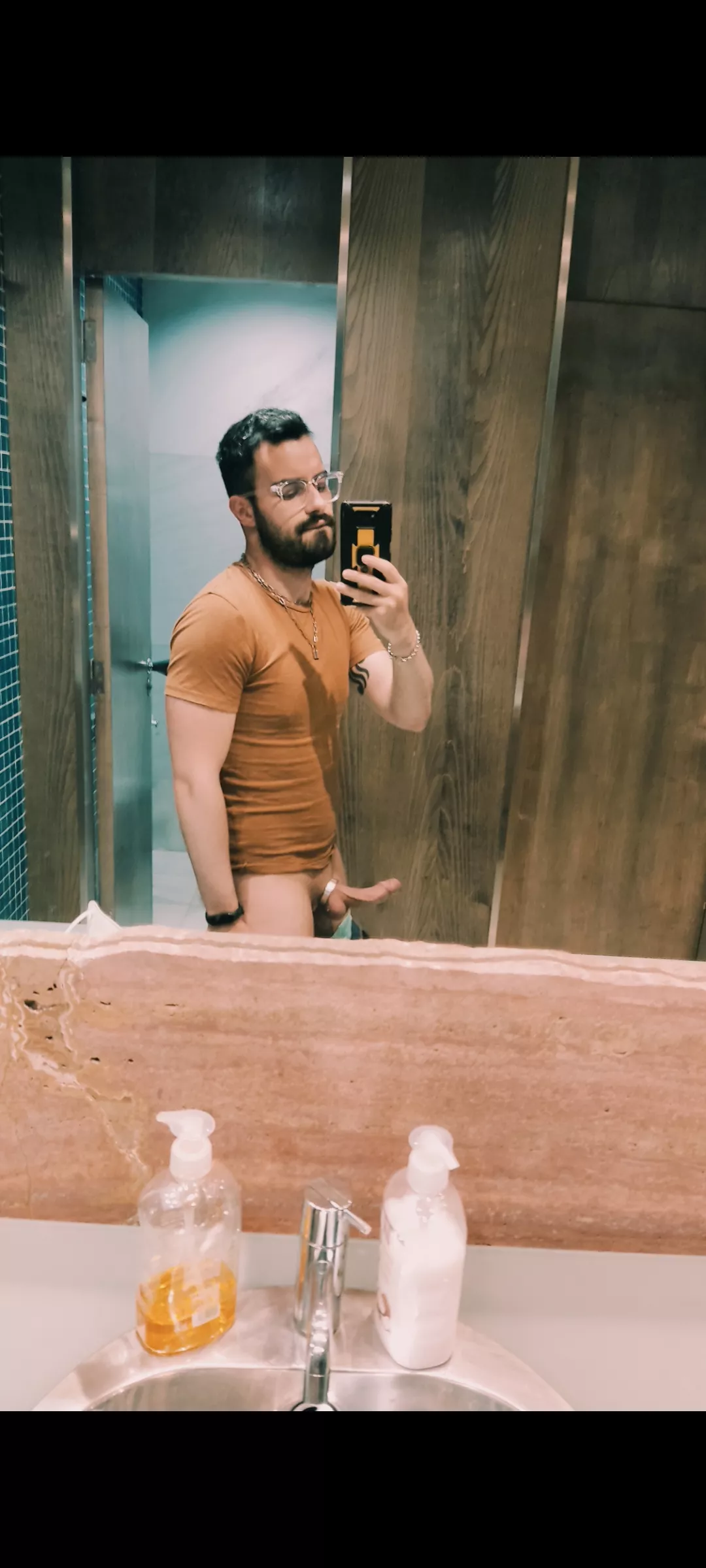 More pics in the bathroom, i enjoy wearing cockrings in the office.