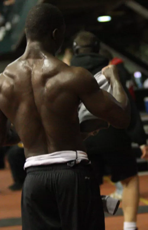 Muscled Wrestler Back After a Match