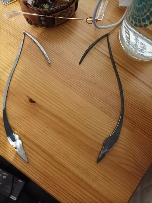 My boyfriend knows I'm a furry. So he brought me these ear shaped-like iron thingies from work (he's a blacksmith) 🥺♥️