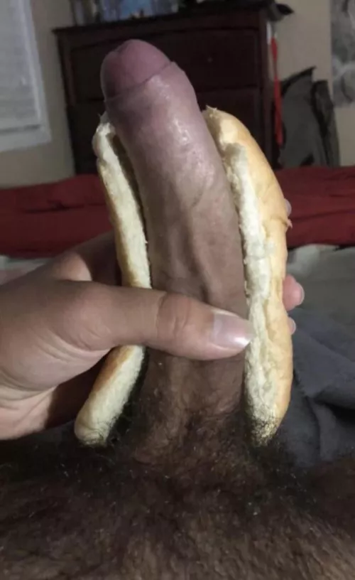 My cock compared to, or I guess just inside of a hotdog bun.