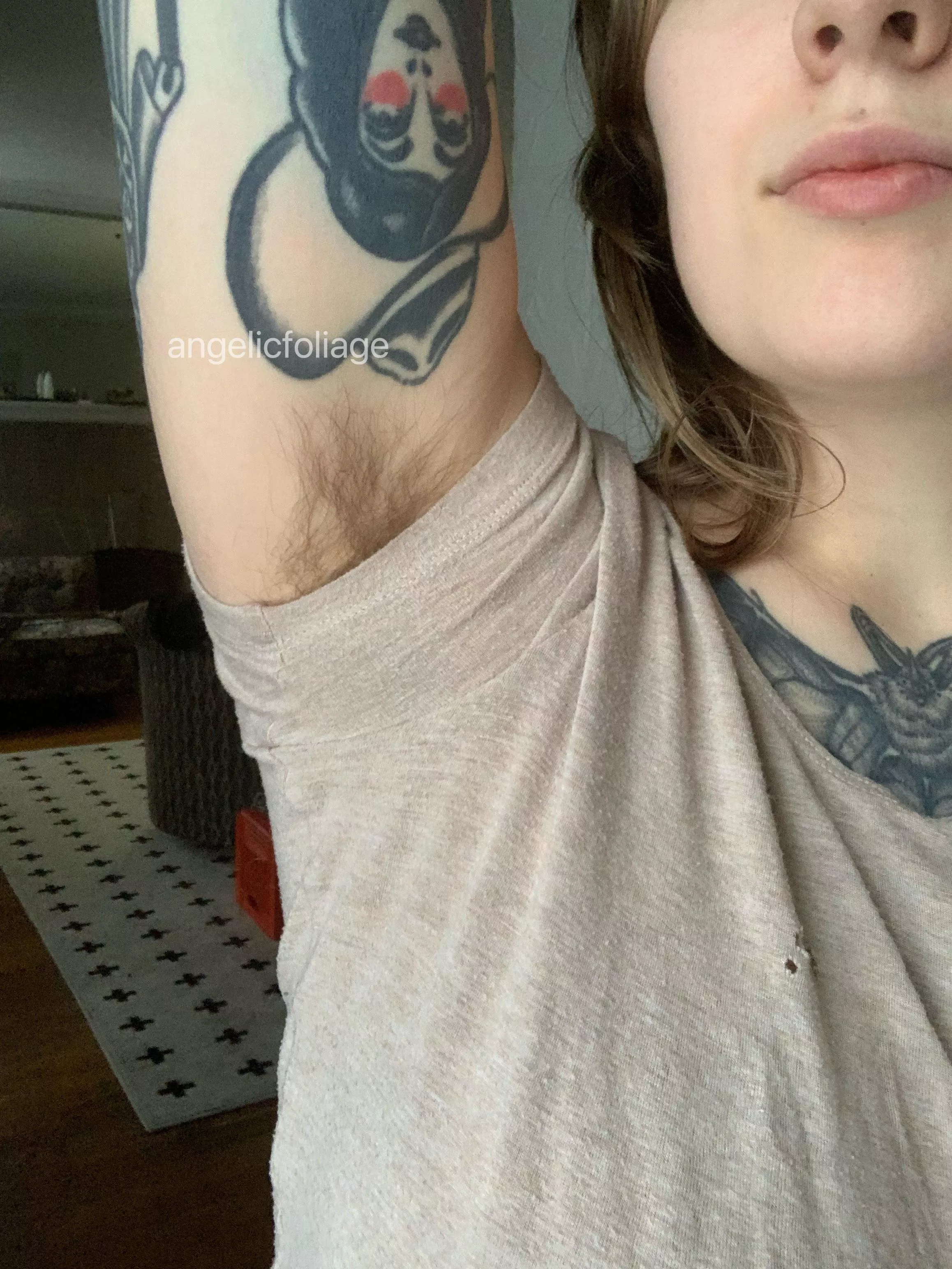 My fur is peeking out of this tiny shirt!