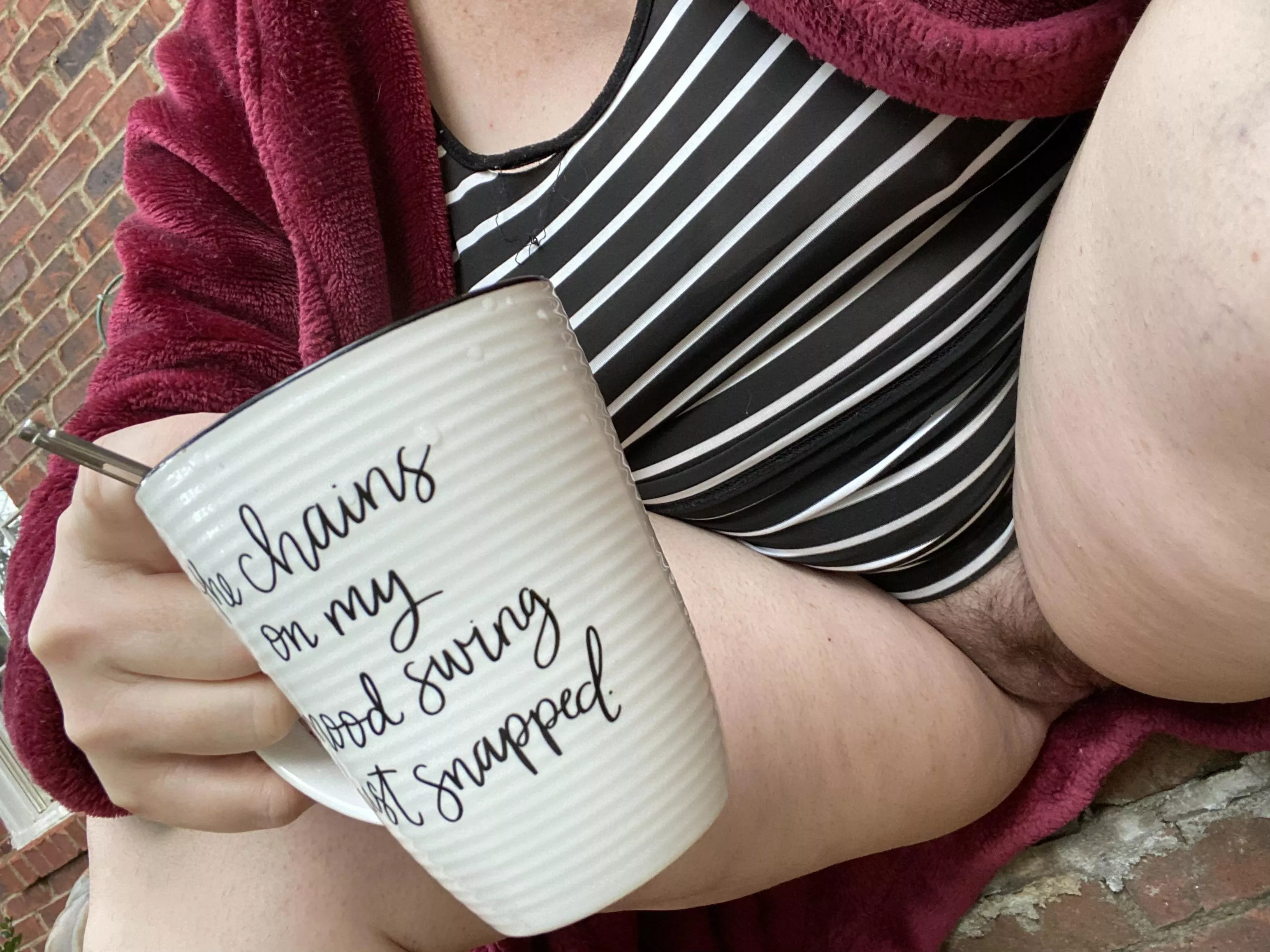 My kitty is enjoying risky open air coffee on her front porch! My kitty is enjoying risky open air coffee on her front porch!