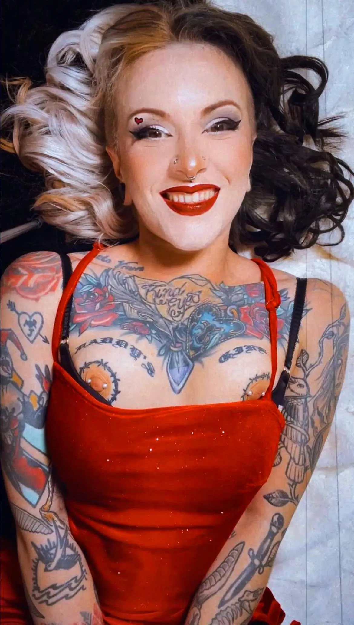 My tattooed little boobs fell out of my dress when I laid down 🤪