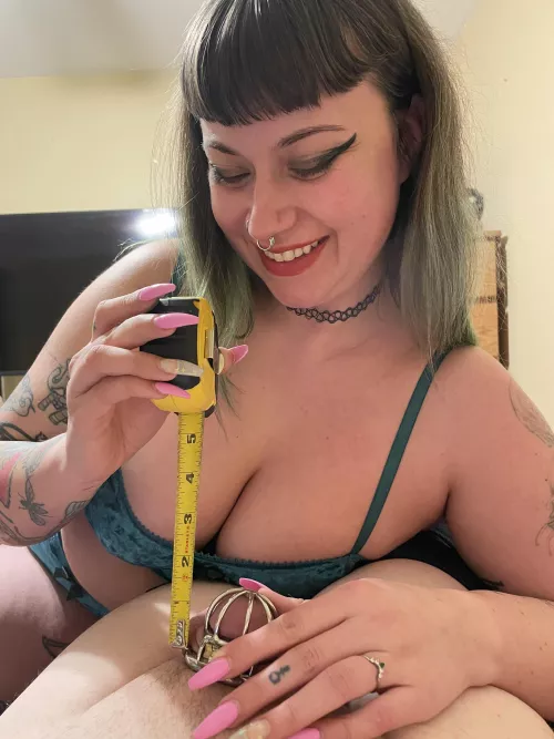 My wife laughing at my caged cock