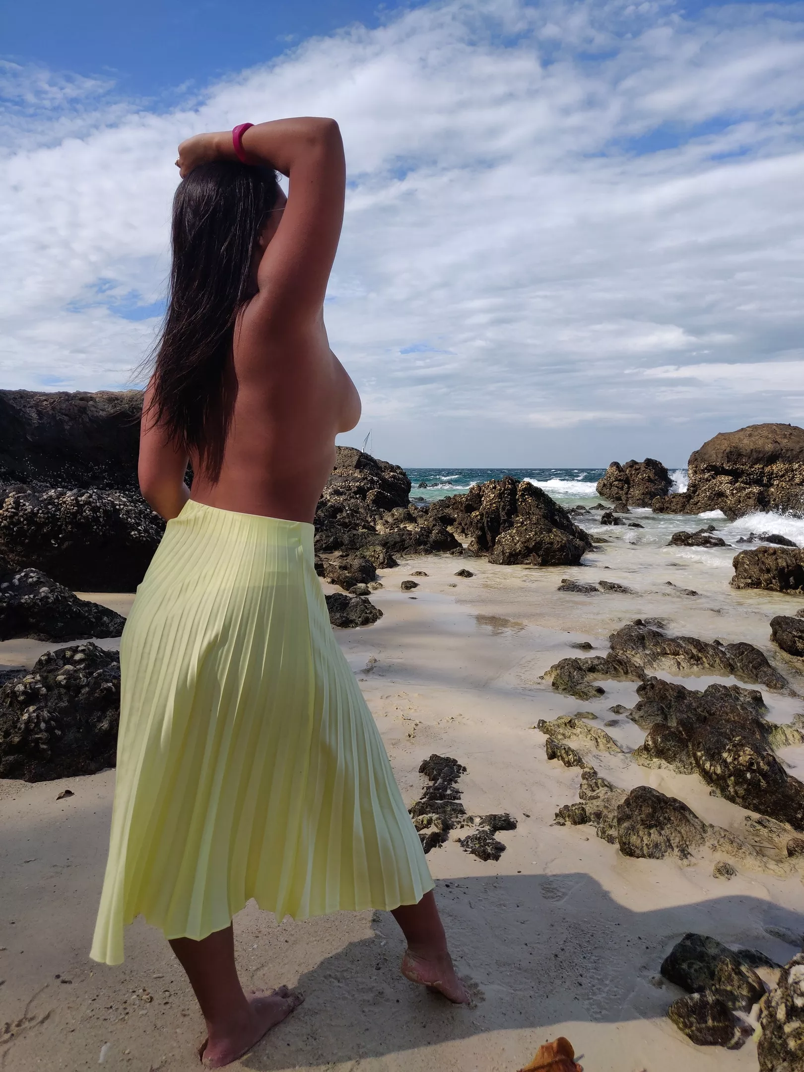 My wife shows her sideboob on private island