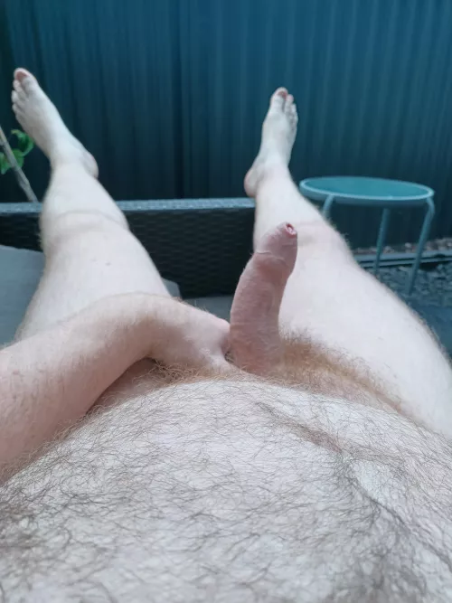 Naked relaxing in the sun