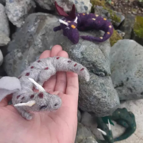 Needle felted dragons I made!! I love the grey one the most 🐲❤