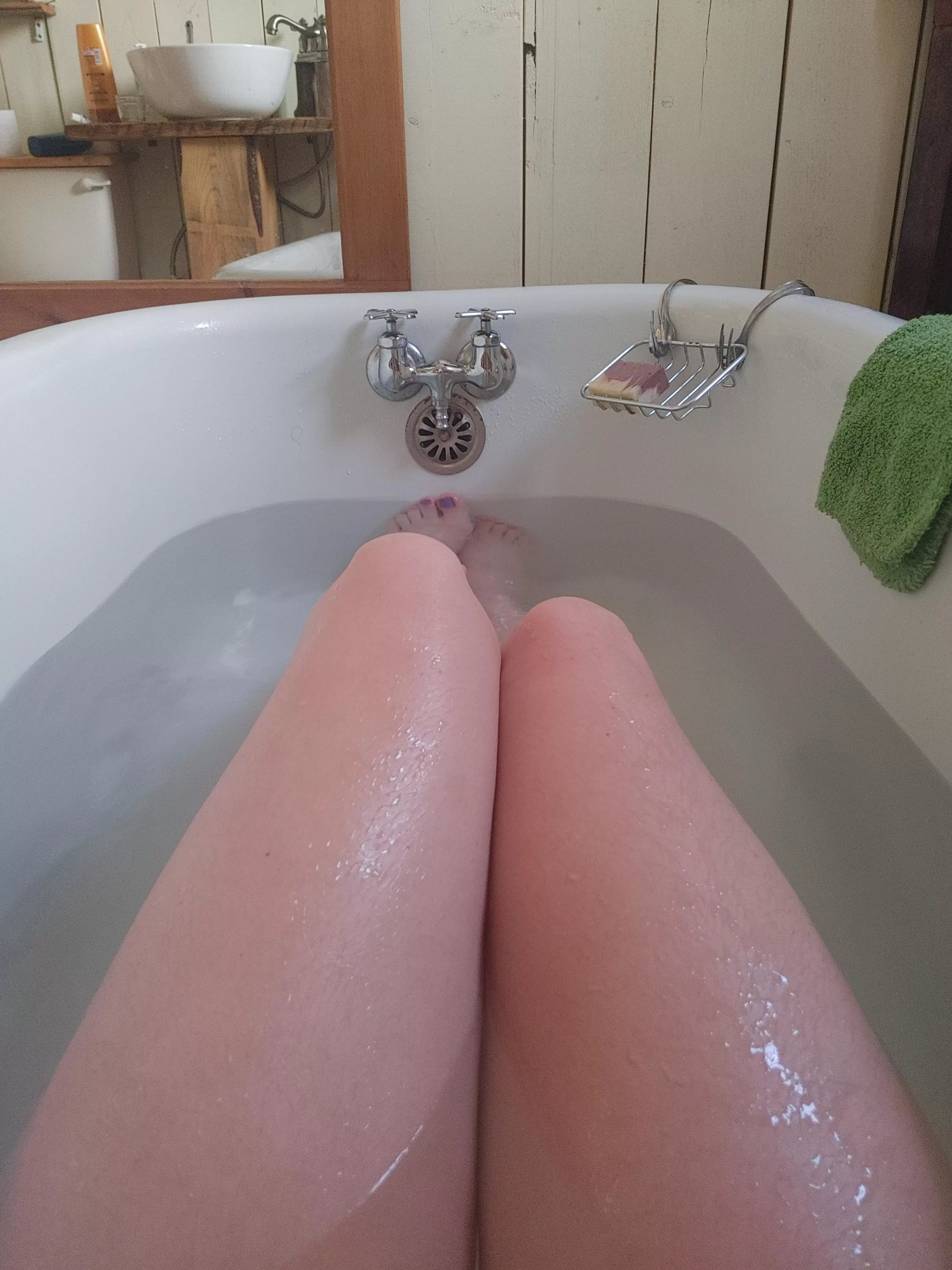Nice hot bath in an old antique tub :) are you a fan of long legs?