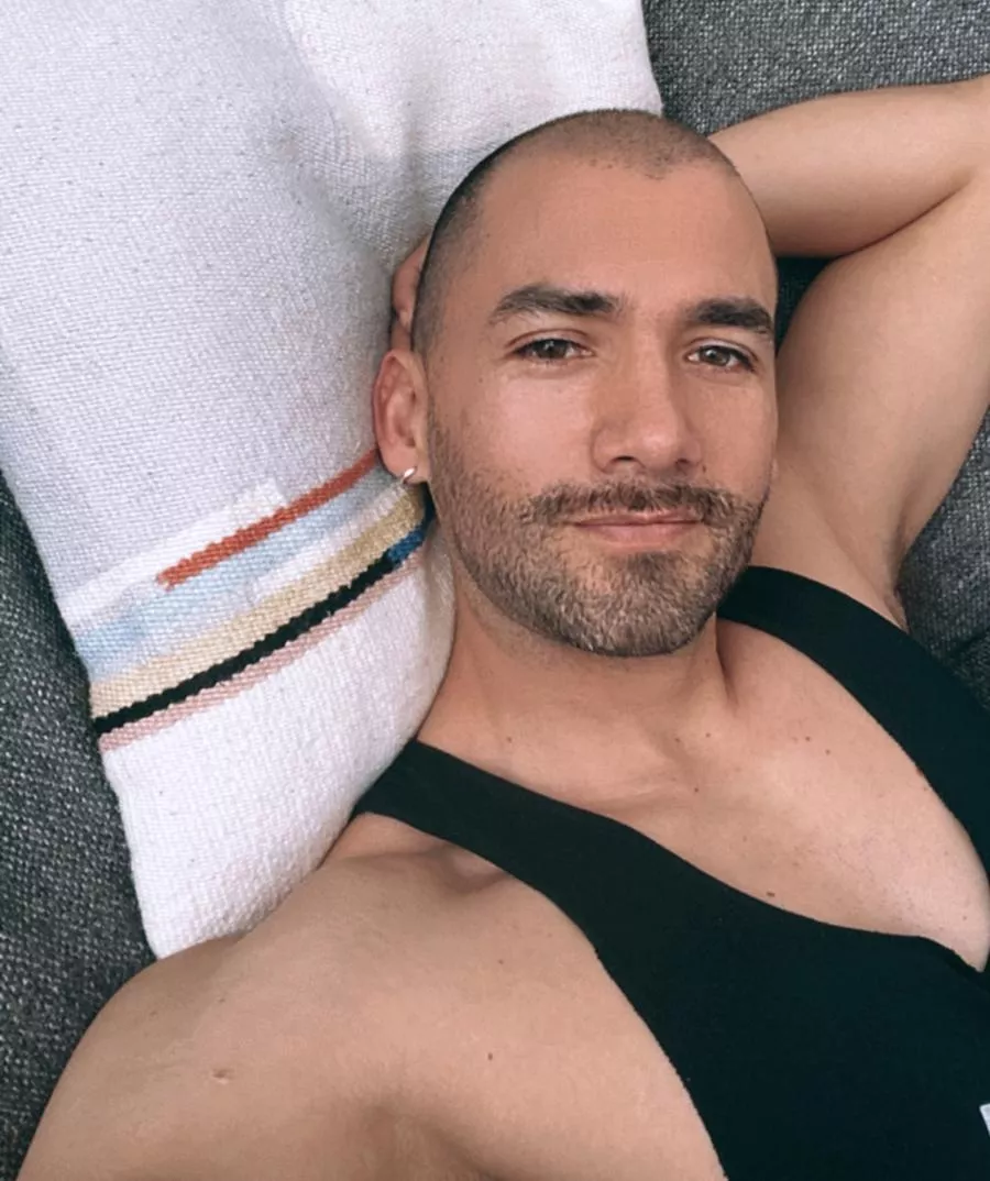 One latino, one couch and a few beard grays