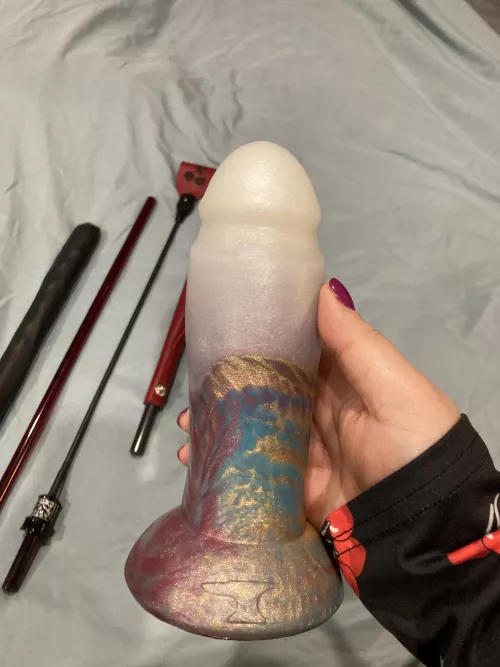 One of the Xmas presents my sissy got me is this magnificent giant glow in the dark cock which I intend to use to split him in half (the rest are in the background)