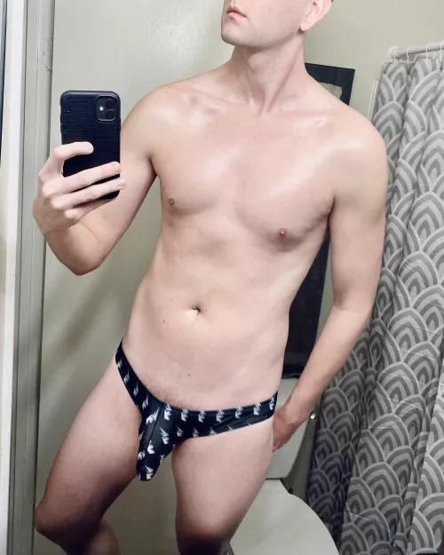 Pale boy in a thong