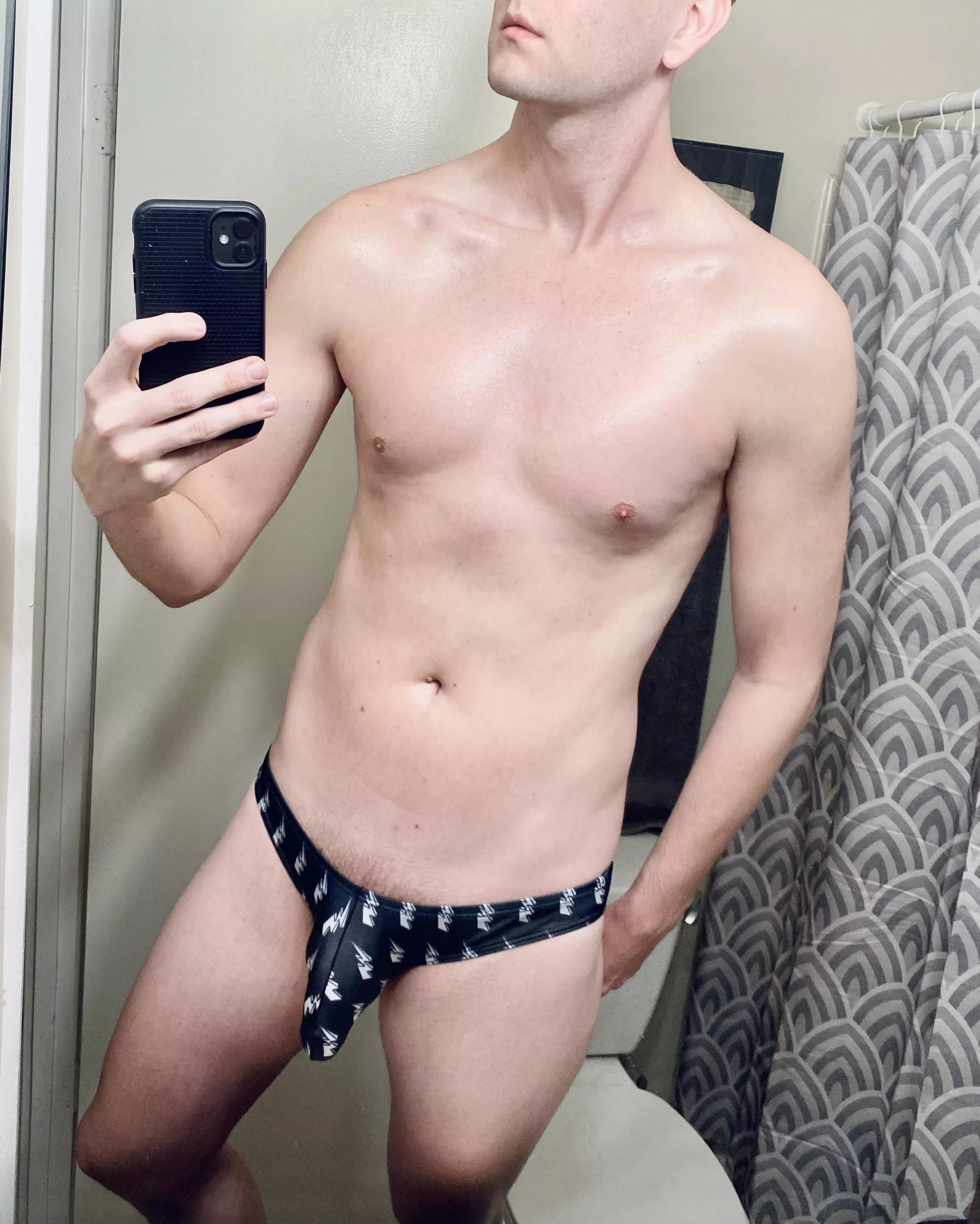 Pale boy in a thong