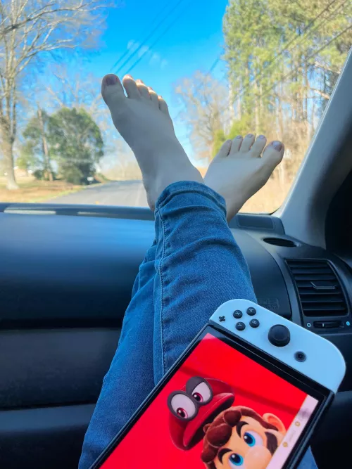Playing Mario odyssey on a road trip. My tiny toes need new polish. What color should paint them?