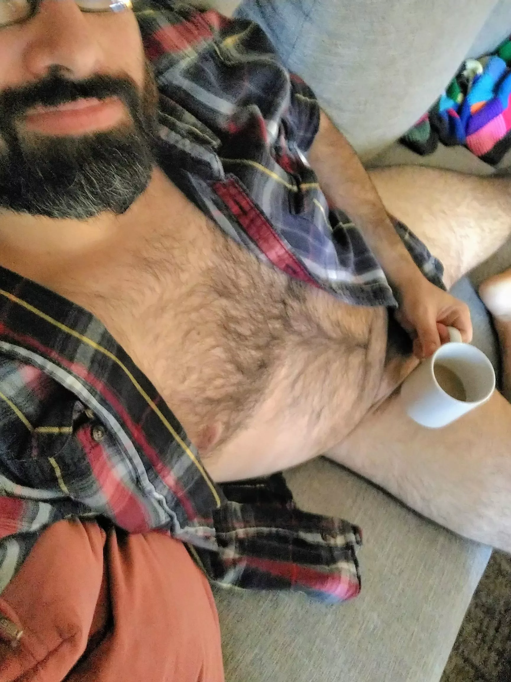 POV, you walk in and having a cup on the sofa. POV, you walk in and having a cup on the sofa.