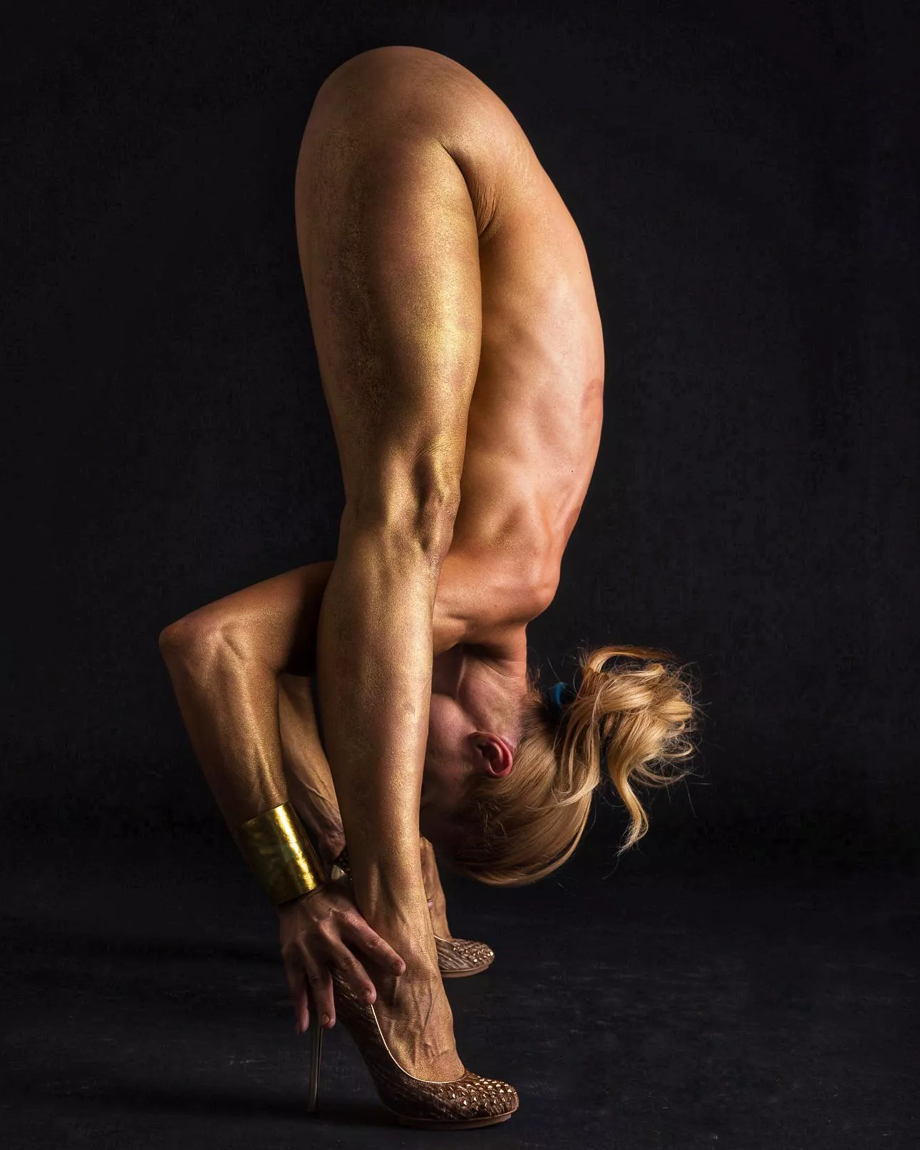 Prasarita Padottanasana in the stilettos Prasarita Padottanasana in the stilettos