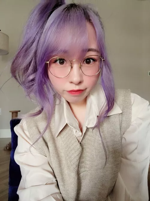 Purple hair and glasses