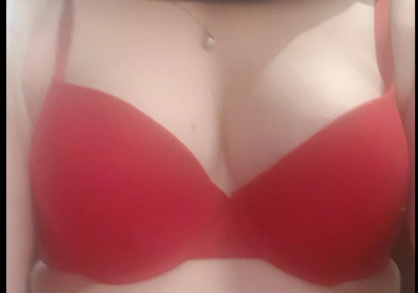 Red bra covering a new nipple piercing 😈