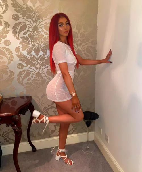Red hair white dress