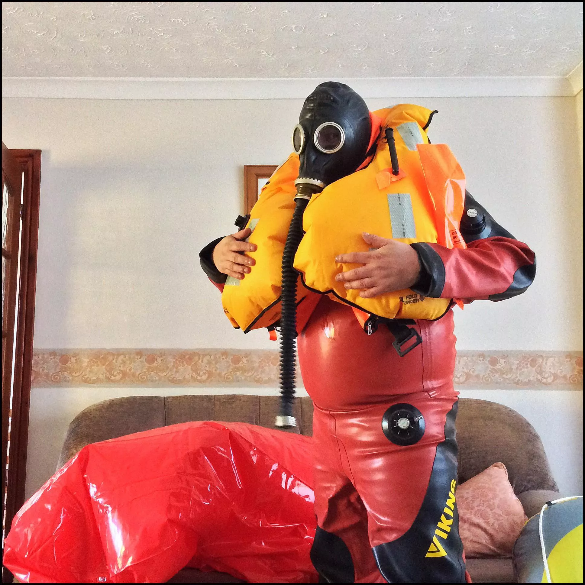 Red n black Viking with Challenger ?? 275 N offshore life jacket. Red n black Viking with Challenger ?? 275 N offshore life jacket.