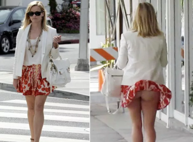 Reese Witherspoon’s skirt blows up (lower quality)