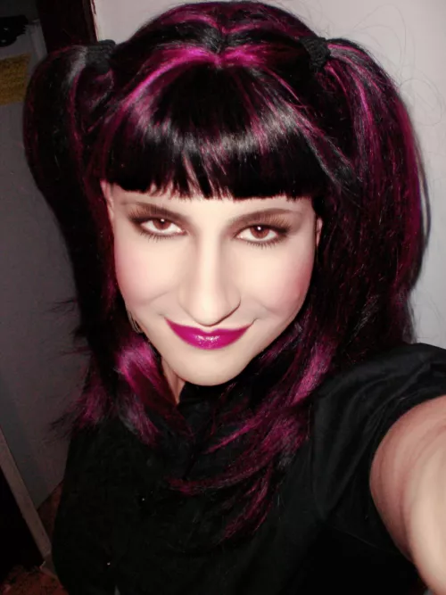 Santa brought me cute purple pigtails and lipstick!