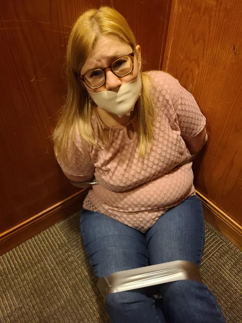 Secretary working late grabbed by her crazy boss. Taking her to the basement of the old building. Can she escape?