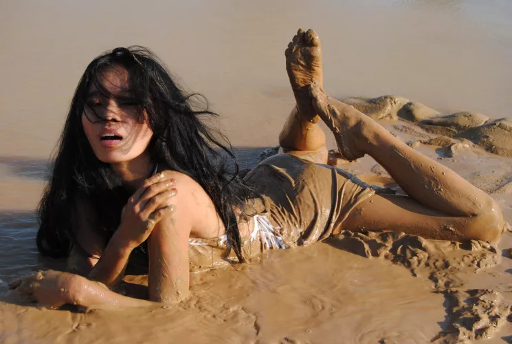 Sexy Filipino playing in the mud