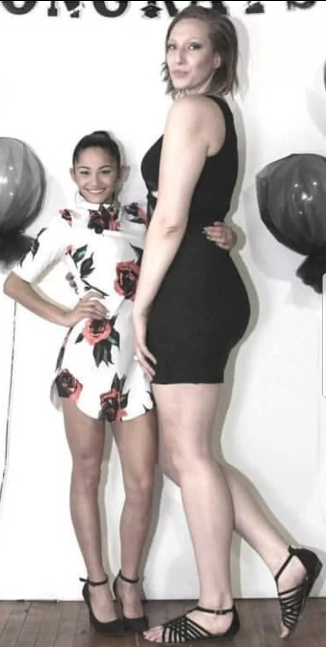 Sexy little brunette needs higher heels or a ladder.