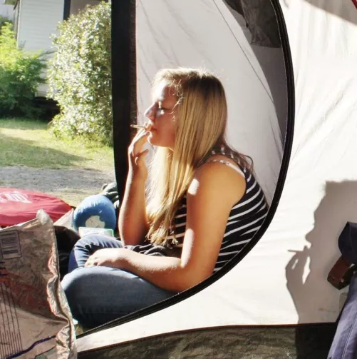 She might look innocent but she lights up many times a day and she enjoys it!