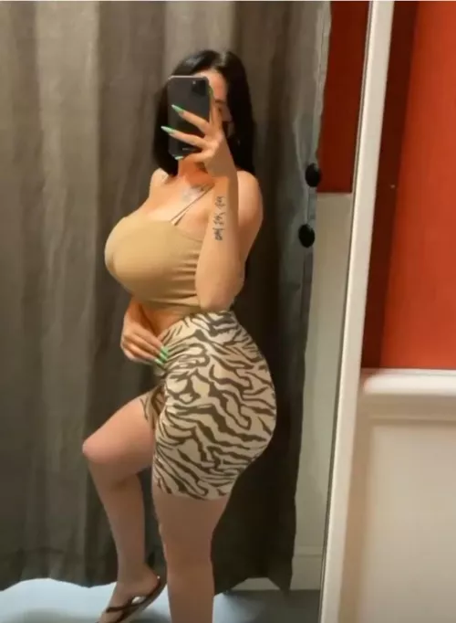 She needs a bigger top to hide them