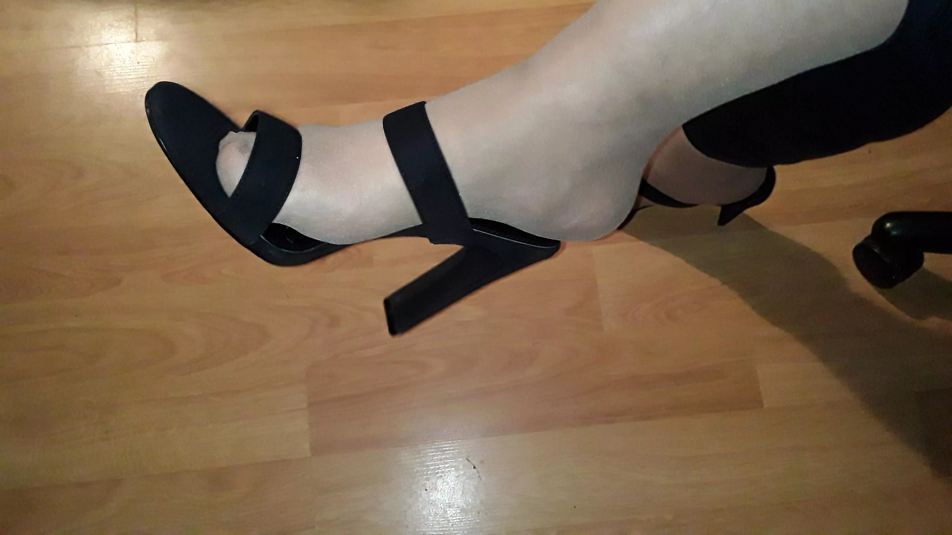 Shiny nylons and a pair of two strap heels...