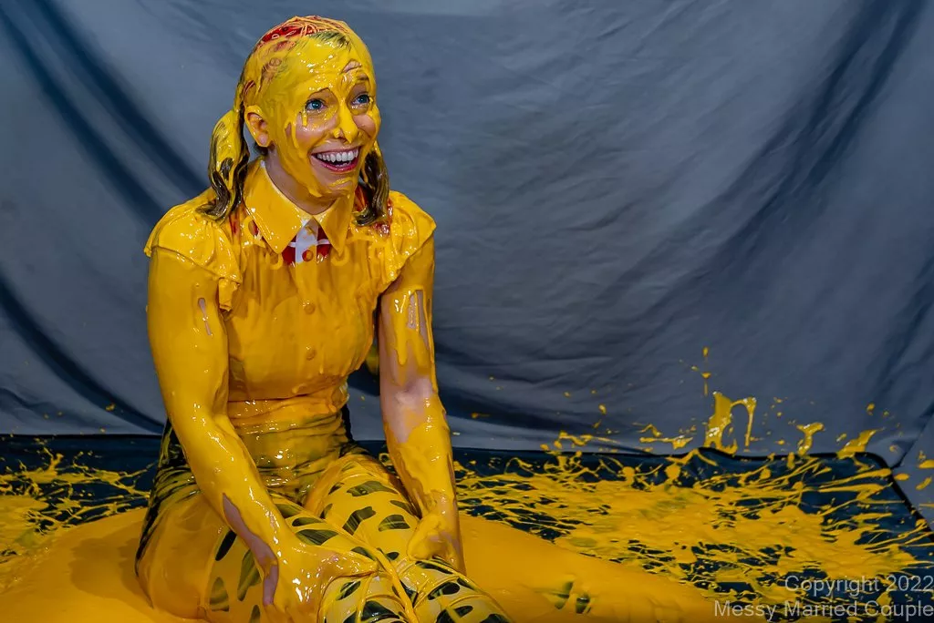 Showered in several gallons of cheddar cheese sauce Showered in several gallons of cheddar cheese sauce