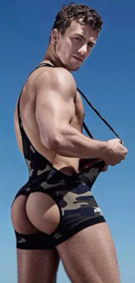 “Showing butt in camo singlet” …