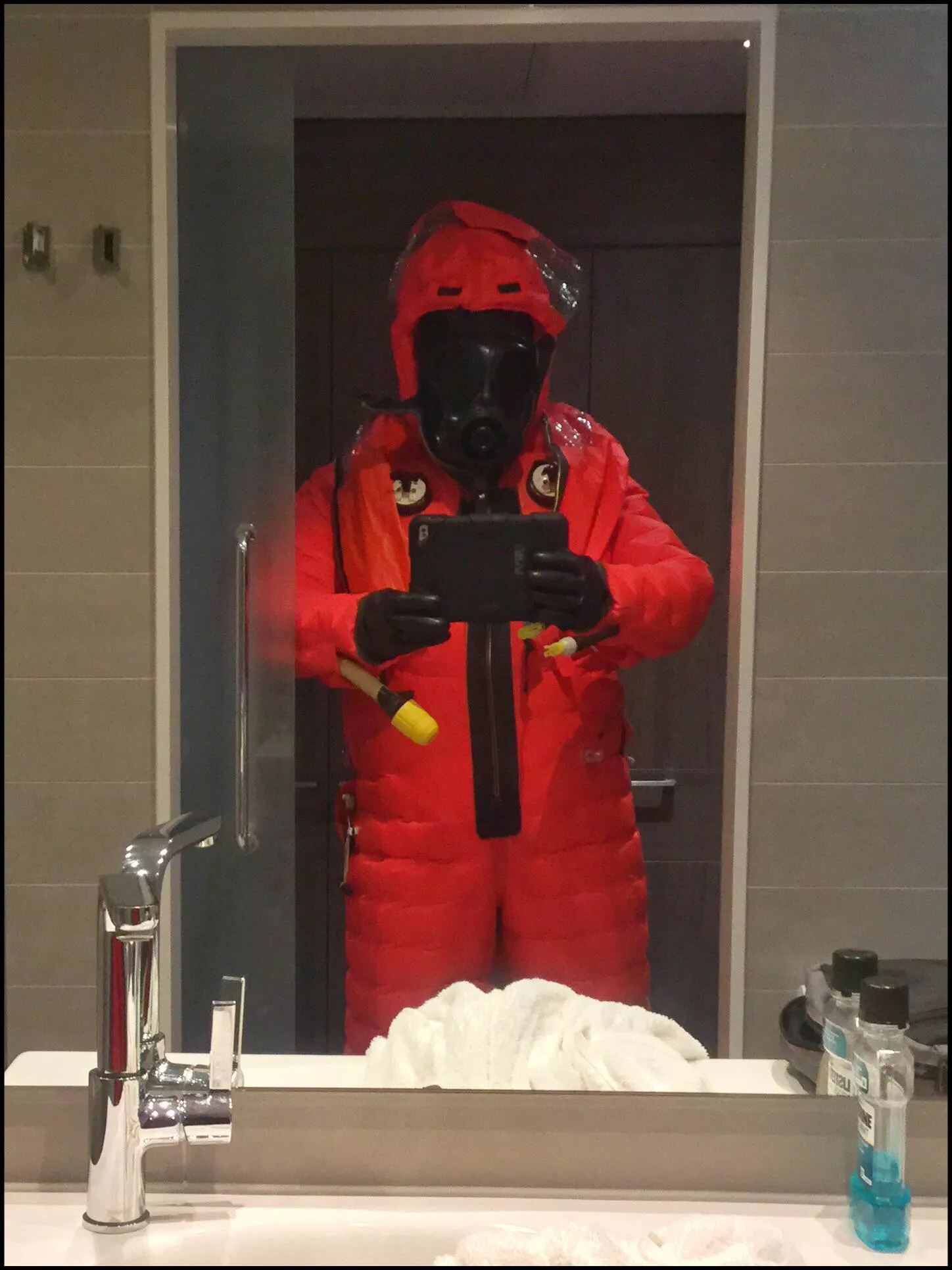 Shuffling around in a very restrictive Submarine Escape Suit….. Shuffling around in a very restrictive Submarine Escape Suit…..